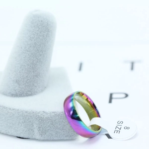 Minimalist iridescent stainless steel rainbow ring size 8 showing colorful gradient finish