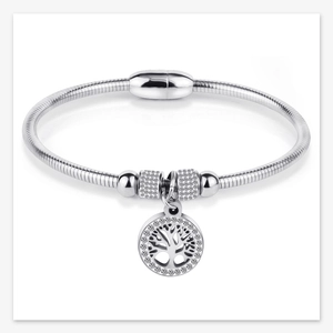 Detail of silver life tree pendant with micro-paved zircons on snake chain bracelet