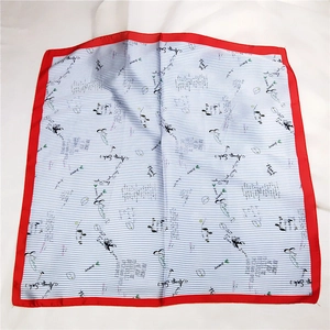 Close-up of red and blue striped silk scarf with inspirational Always Smile typography