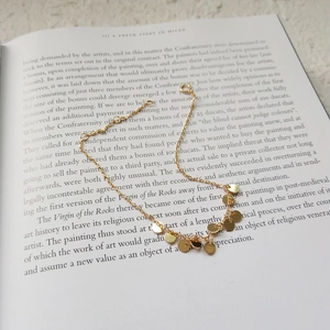 Elegant gold-plated S925 sterling silver chain bracelet with polished round disk charms