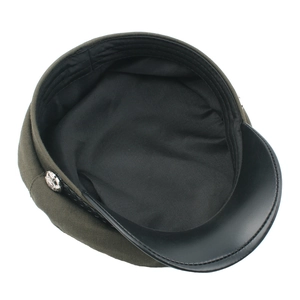 Olive green military newsboy cap with black leather visor and rope button detail