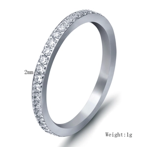 Detail view of 2mm silver stainless steel ring featuring a full row of clear cubic zirconia