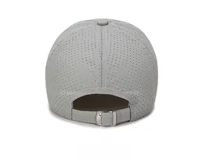 Detail of gray quick-dry baseball cap featuring breathable laser-cut holes and metal buckle