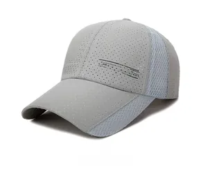 Detail of light gray baseball cap with breathable perforated fabric and Sports embroidery