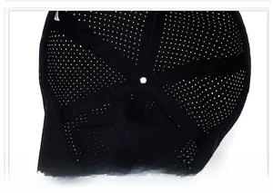 Detail of breathable mesh interior and reinforced seams of a black quick-dry sports cap