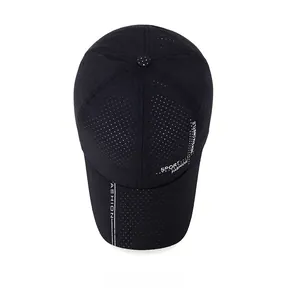 Top view of black quick-dry sport cap with laser-cut holes and breathable mesh fabric