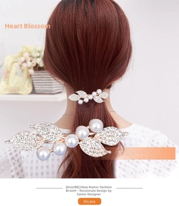 Macro detail of leaf-shaped hair clip with pearls and rhinestones in rose gold finish