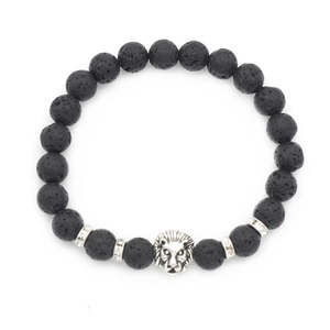Detailed macro shot of black volcanic stone beads with a silver lion head charm for men