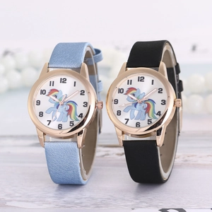 Close-up of kids quartz watches featuring cartoon pony design with leather straps