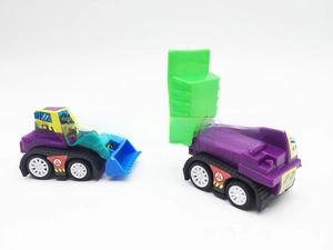Detail of mini cartoon construction toys including a purple bulldozer and dump truck