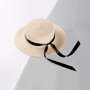 Chic beige straw sun hat with black ribbon bow for women and kids outdoor beach wear