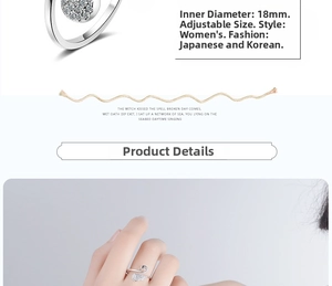 Detail showing the adjustable size and intricate cubic zirconia feathers on swan ring