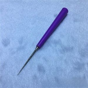 Detail of bead reamer tool with purple handle for pearl drilling and jewelry DIY making