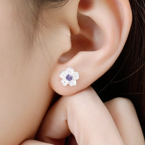 Elegant cherry blossom stud earring with purple gemstone and silver matte finish petals