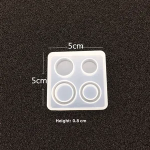 Macro shot of 5x0.8cm square silicone mold with four circular cavities for DIY resin craft
