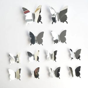Set of 12 silver 3D mirror butterfly wall stickers in various sizes for home decor