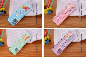Cute double-sided cartoon pencil cases in four colors with built-in sharpener