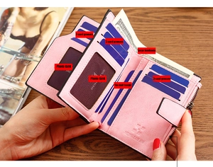 Detail view of pink leather wallet interior showing card slots and storage compartments