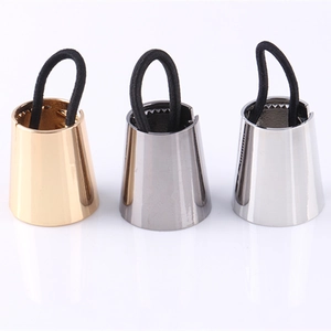 Three-piece metallic ponytail cuff set in gold, gunmetal, and silver with black elastic