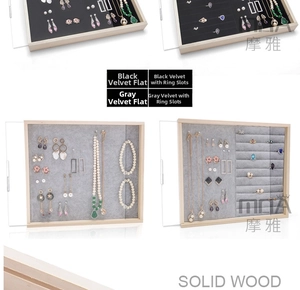 Solid wood jewelry tray detail with soft velvet lining for rings and necklaces