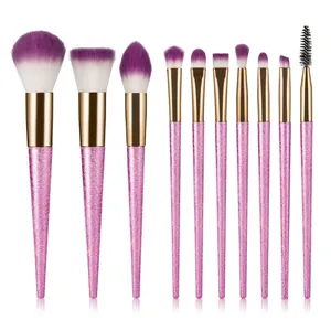 10-piece professional makeup brush set with pink glitter handles and purple gradient bristles