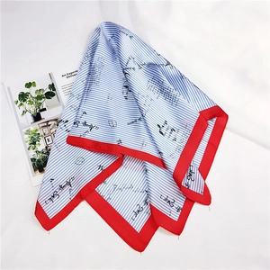 Detail of blue white striped silk scarf with red border and Always Smile print