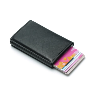 Detail showing the automatic pop-up mechanism and premium leather texture of the card holder