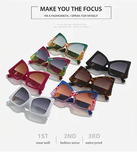 Flat lay of colorful oversized bow-style square sunglasses with gradient lenses