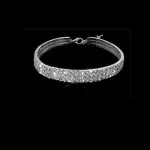 Close-up of the silver elastic rhinestone pet collar with dense sparkling crystals
