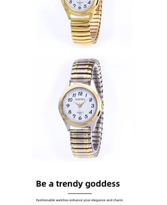 Detail of gold and silver quartz watches with elastic metal bands and large numerals