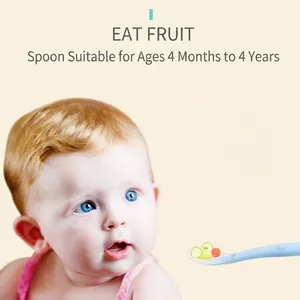 Blue silicone baby training spoon with fresh fruit bits for infant feeding stages