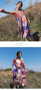 Outdoor shot of a Bohemian style long linen scarf with vibrant floral patterns
