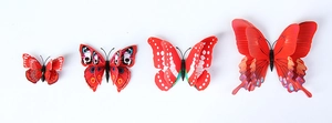 Macro shot of 3D double-layered red butterfly wall stickers with detailed patterns