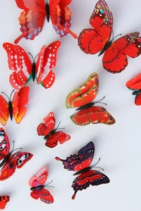 Detailed view of red 3D double-layer artificial butterflies for wall decoration