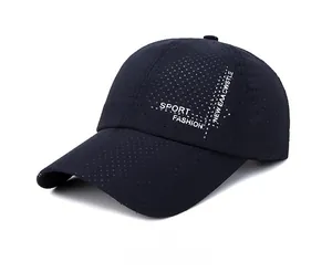 Detail view of navy blue breathable mesh sport cap with side logo and curved brim
