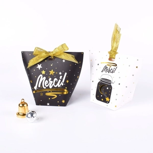 Detail of Korean candy gift boxes with Merci gold foil print and matching ribbons