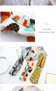 Close-up of floral and geometric print knotted headbands with elastic fabric textures