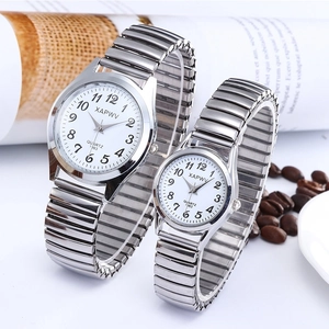 Silver quartz watches with elastic bands and clear white dials for elderly couples