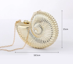Detail of golden shell evening clutch with chain strap, showing 18.5cm x 15cm dimensions