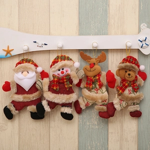 Set of four plush Christmas ornaments featuring Santa, Snowman, Reindeer, and Teddy Bear