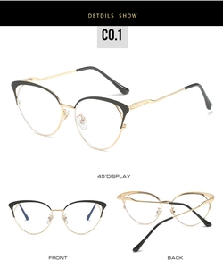 Detail view of cat eye glasses showing vintage hollow metal temples and golden floral texture