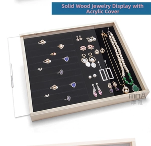 Solid wood jewelry box with black velvet slots for rings, earrings and necklaces