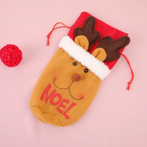 Sac à vin de Noël motif renne avec inscription NOEL sur fond rose festif élégant