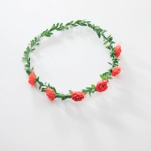 Floral foam rose headband featuring red flowers and green leaves on white background