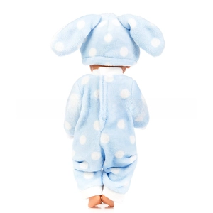 Detail of light blue polka dot doll pajamas with soft plush bunny ear hood on white background
