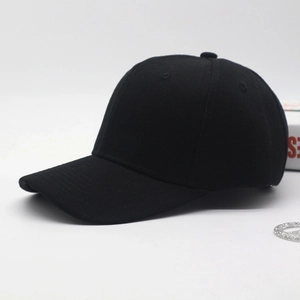 Classic black cotton baseball cap for men and women, side view on white background
