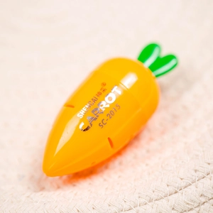 Cute carrot-shaped manual pencil sharpener in bright orange with green leaf top SC-2015