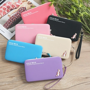Long leather wallets in multiple colors featuring metal high heel charm and wrist strap