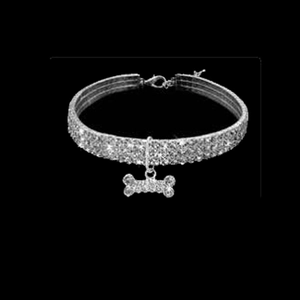 Detail of rhinestone pet collar with sparkling bone pendant and adjustable silver chain