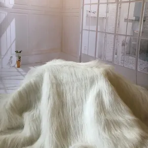Plush long-pile faux fur fabric in cream white for carpets and photo backdrops